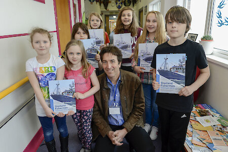 SFA executive officer Simon Collins with pupils from Bell’s Brae Primary School.